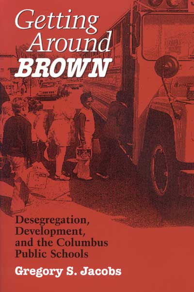 Getting Around Brown cover image, showing a black and white photograph of children of different races entering a school bus